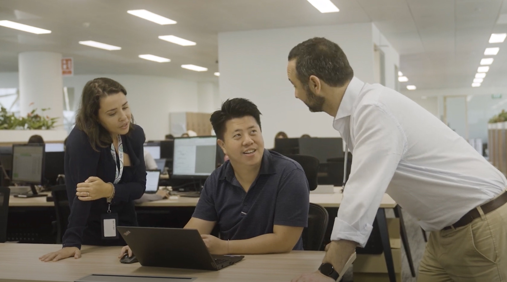 employees having an informal meeting in apac offices