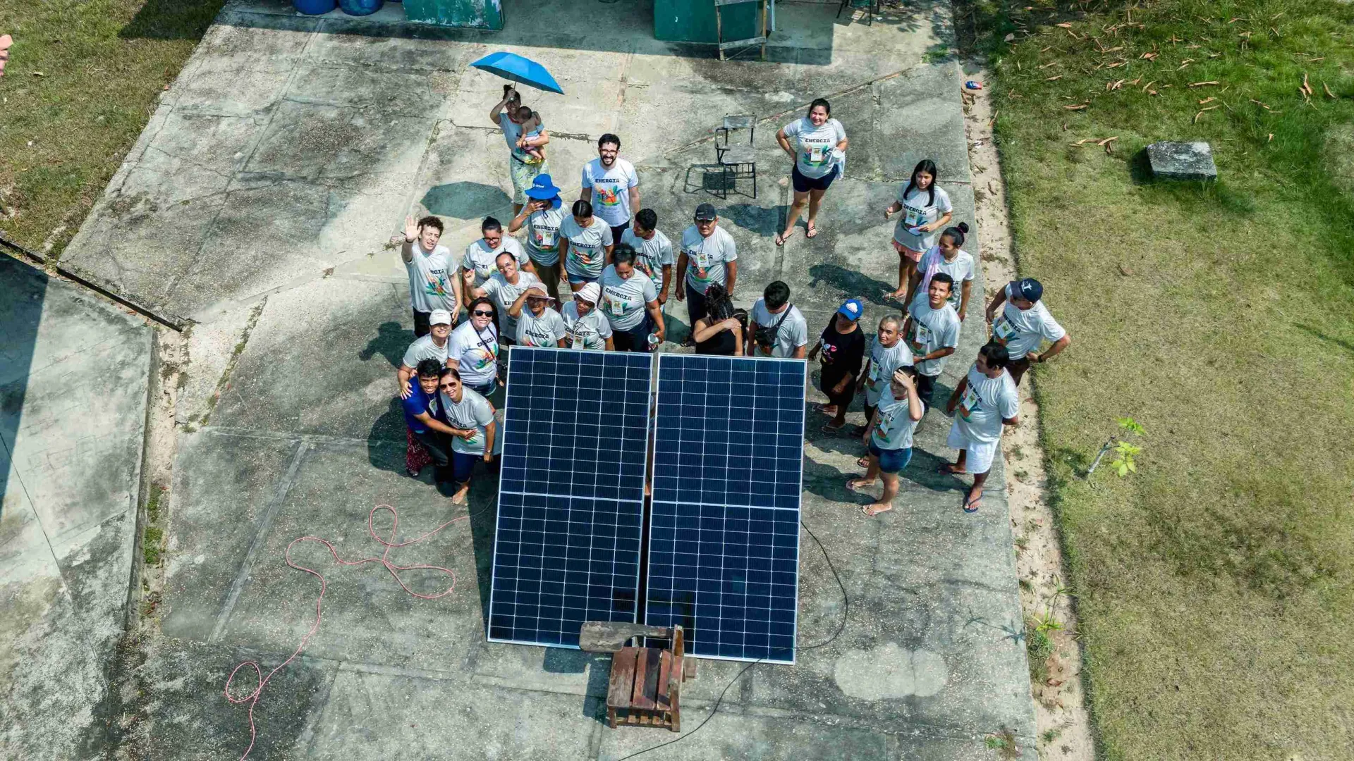 kids standing next to a solar panel